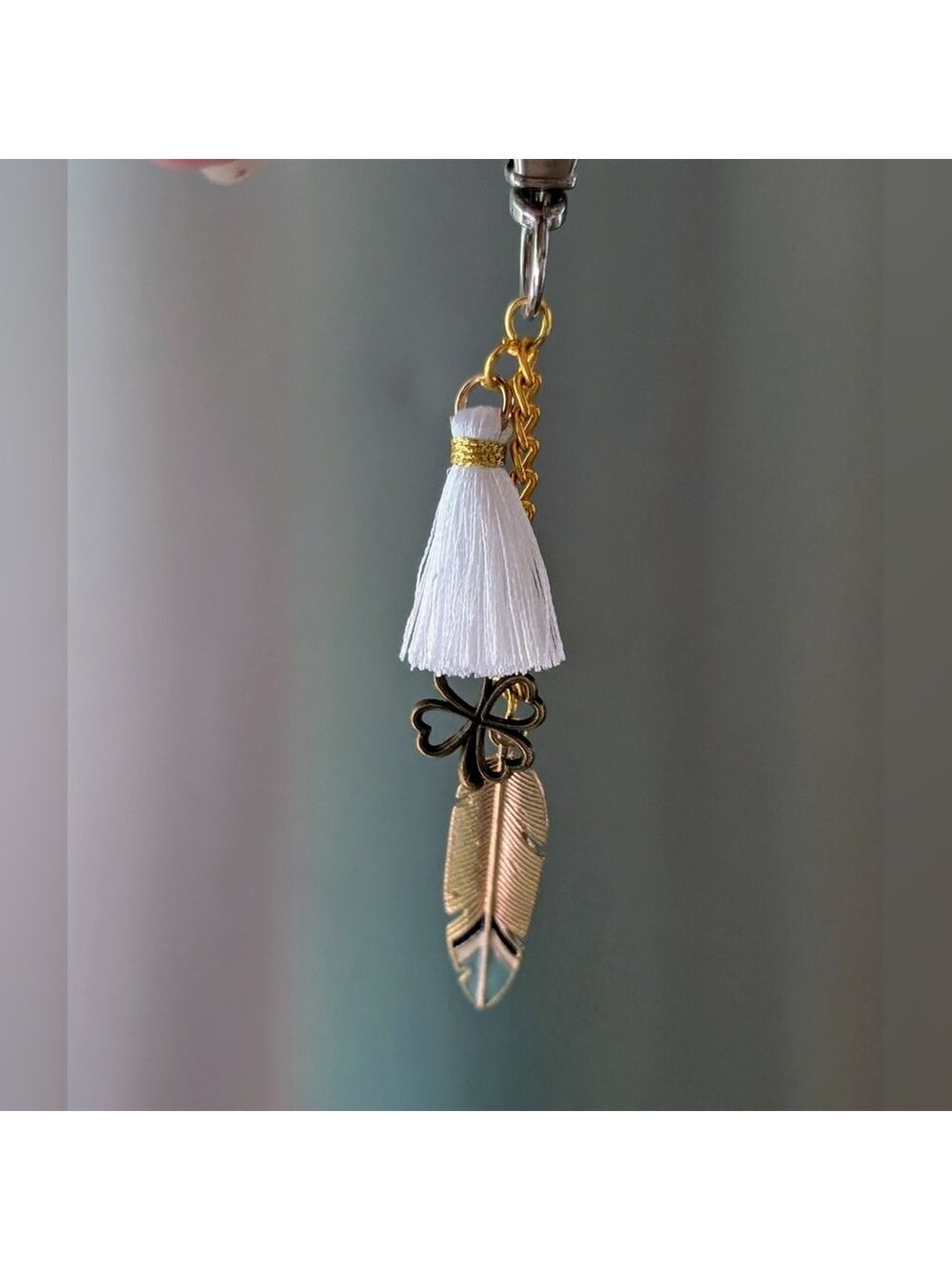 Four Leaf Clover And Feather Bag Charm With Tassel